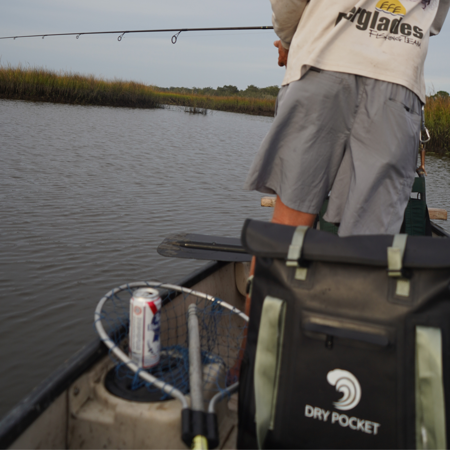 Waterproof floating tote cooler with DRY POCKET logo on dark gray front panel