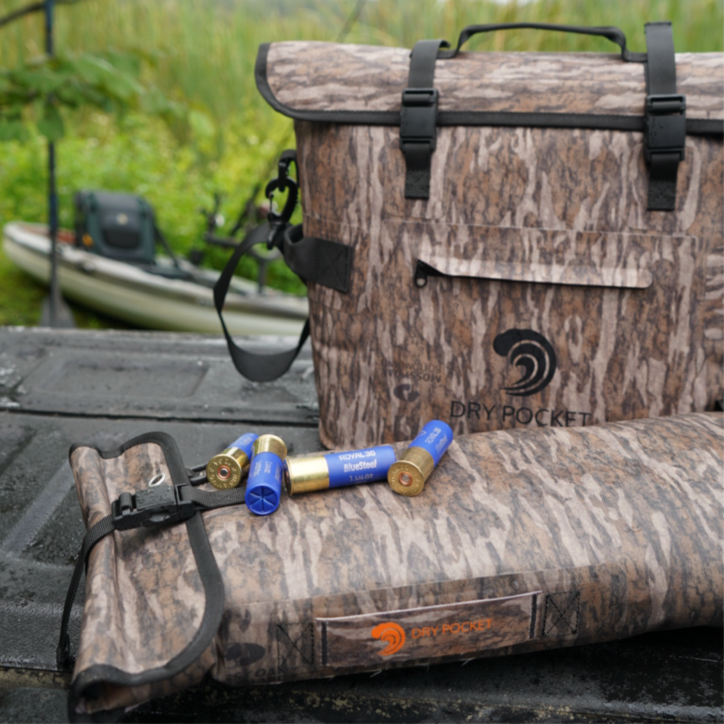 Mossy oak camo floating cooler bag with top straps and DRY POCKET label