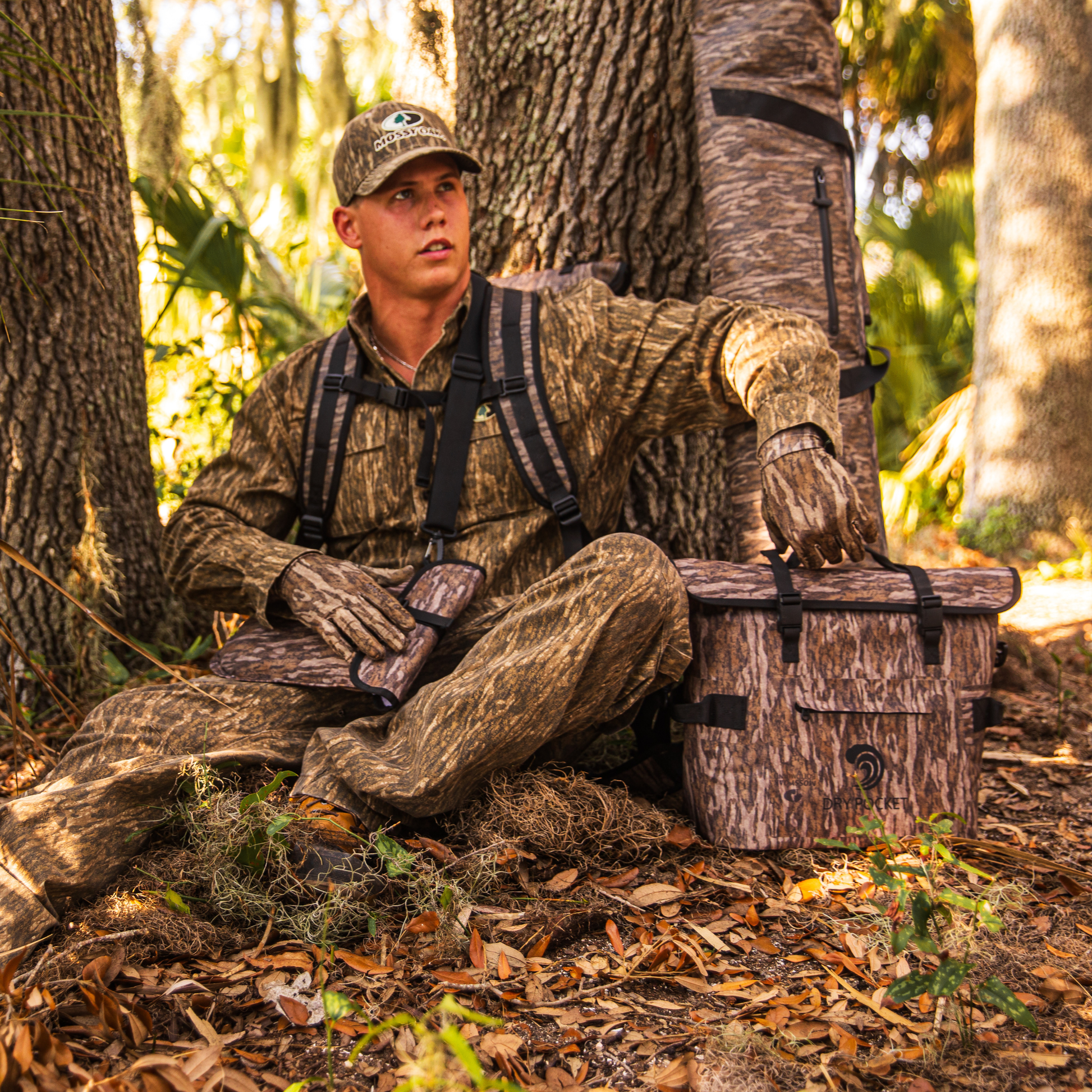 Waterproof floating cooler bag, mossy oak camo with black webbing straps