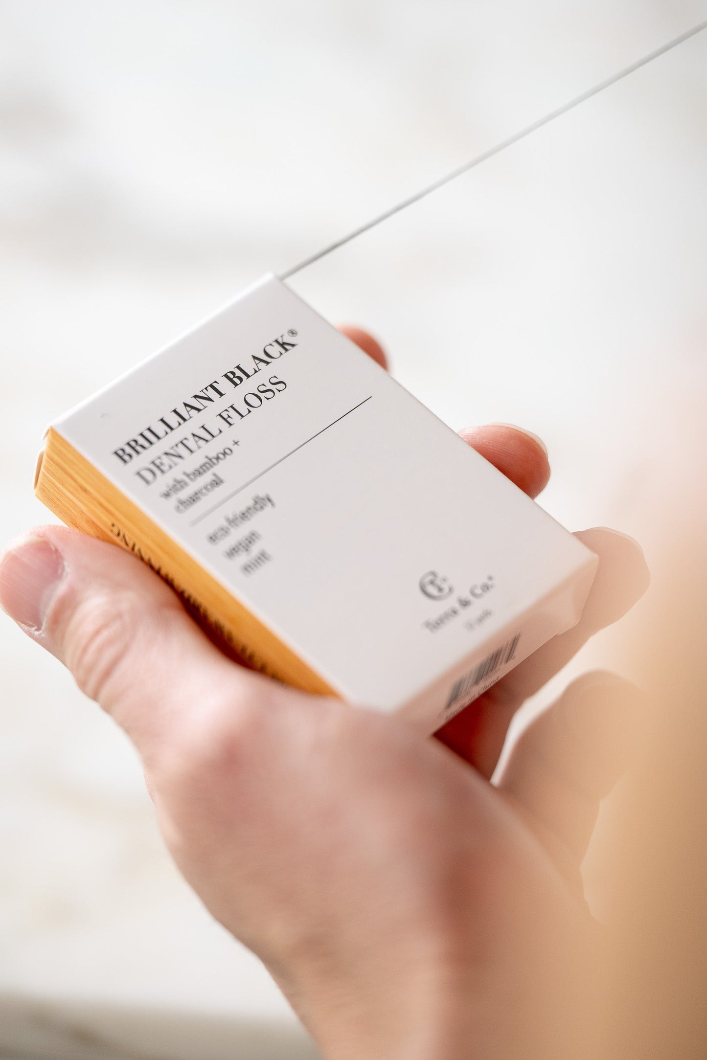 Brilliant Black® Floss – Whitens Between Teeth Naturally Terra & Co.