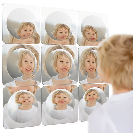 Bubble wall mirror set of rounded acrylic squares with child face reflections