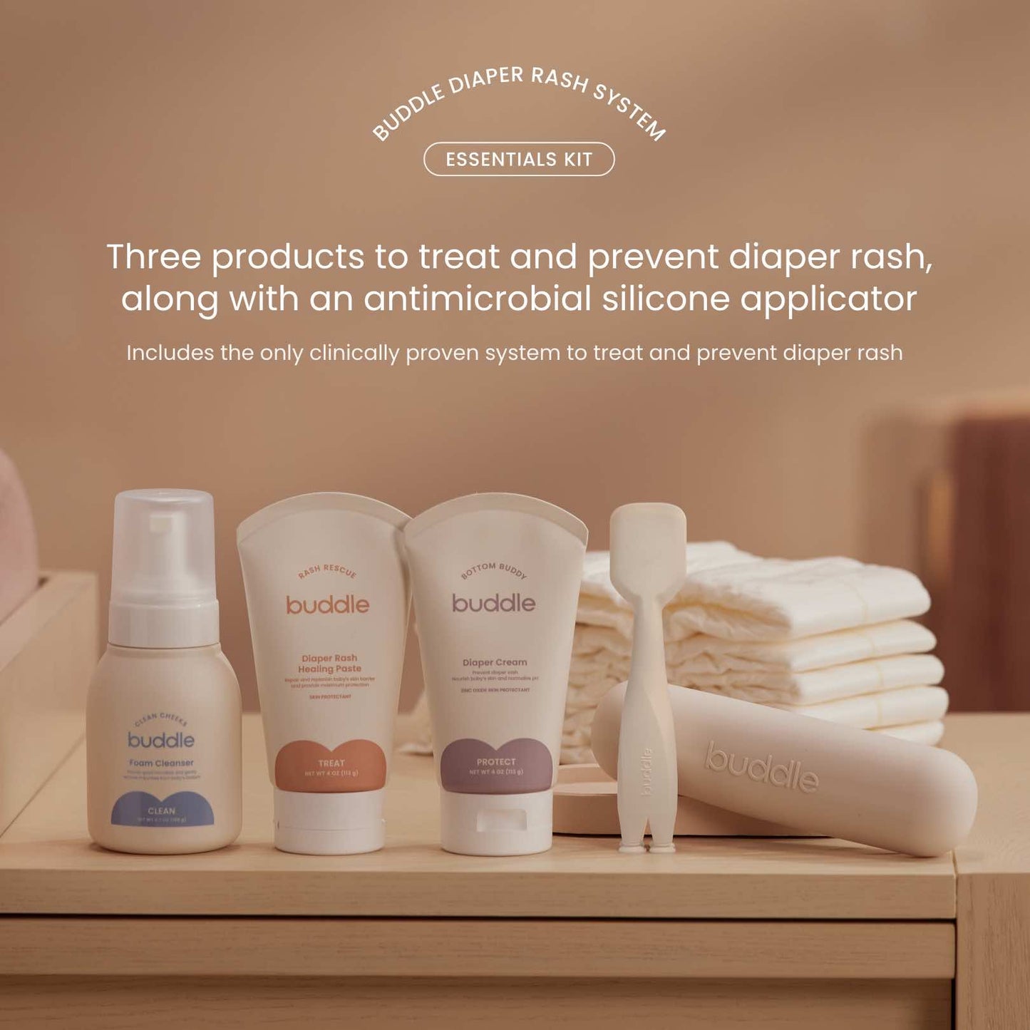 Diaper rash system essentials kit on shelf with applicator, cleanser, cream, healing paste