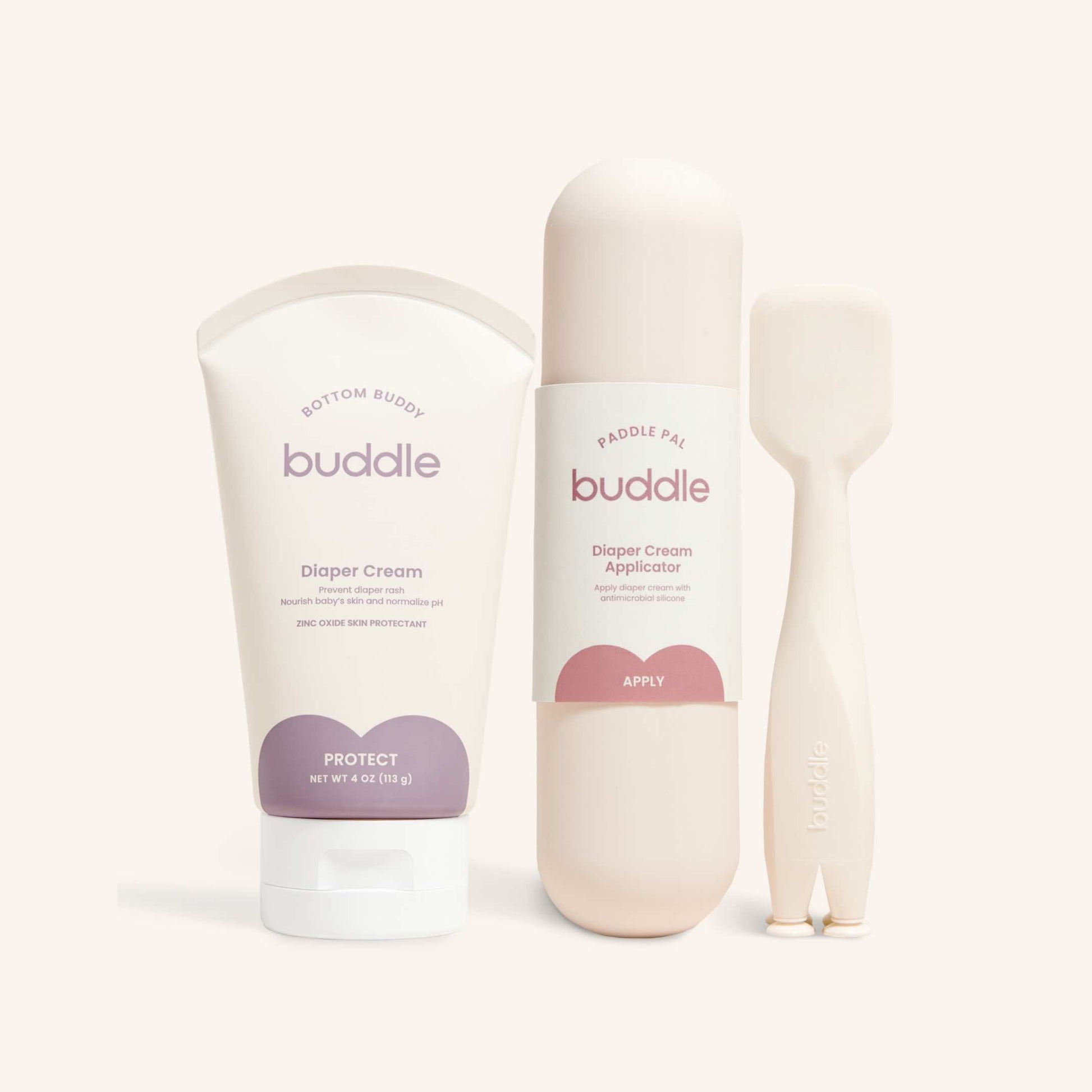 Diaper cream tube and silicone applicator set with cream dispensing nozzle