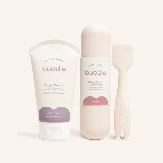 Diaper cream tube and silicone applicator set with cream dispensing nozzle