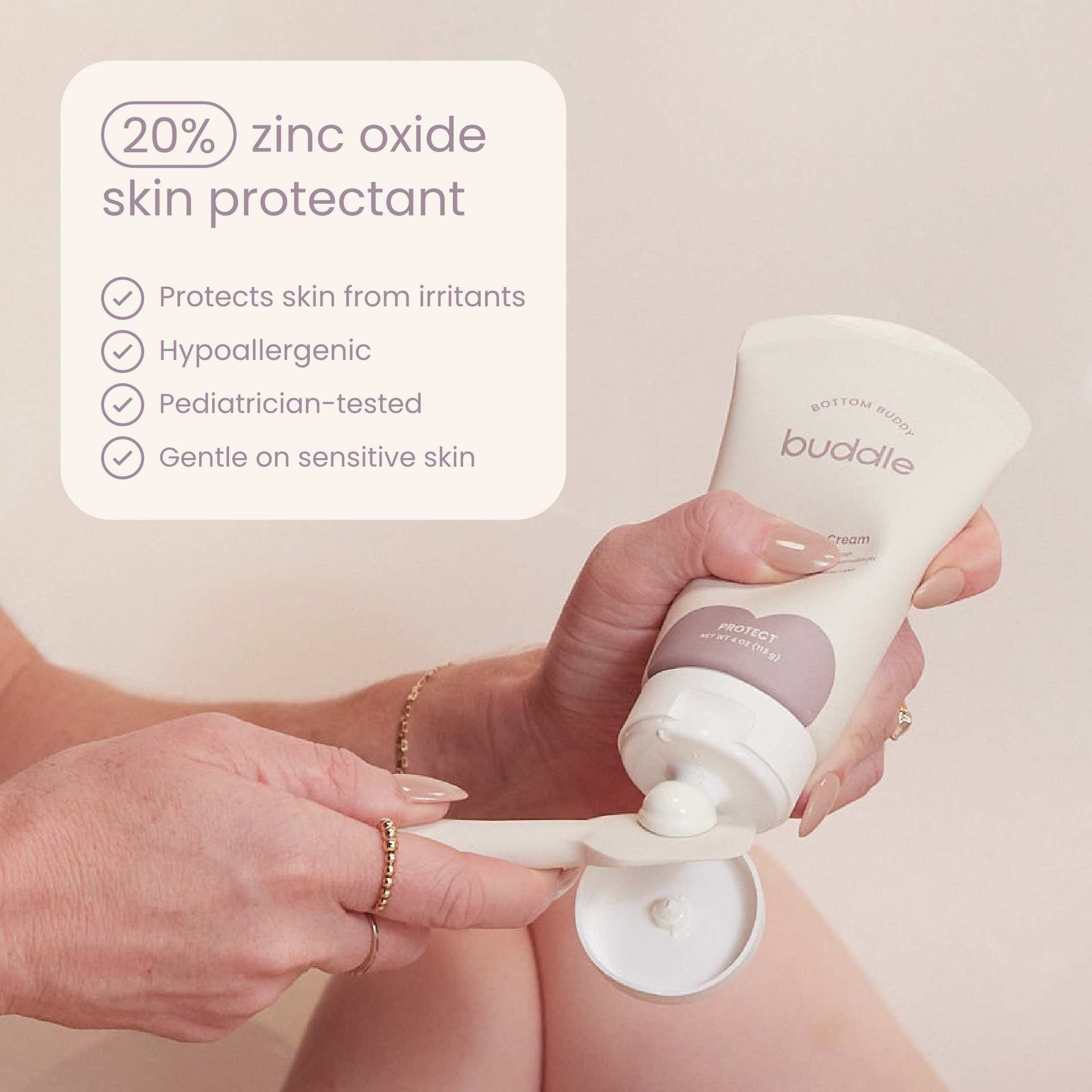 Diaper cream tube dispensing cream with silicone applicator
