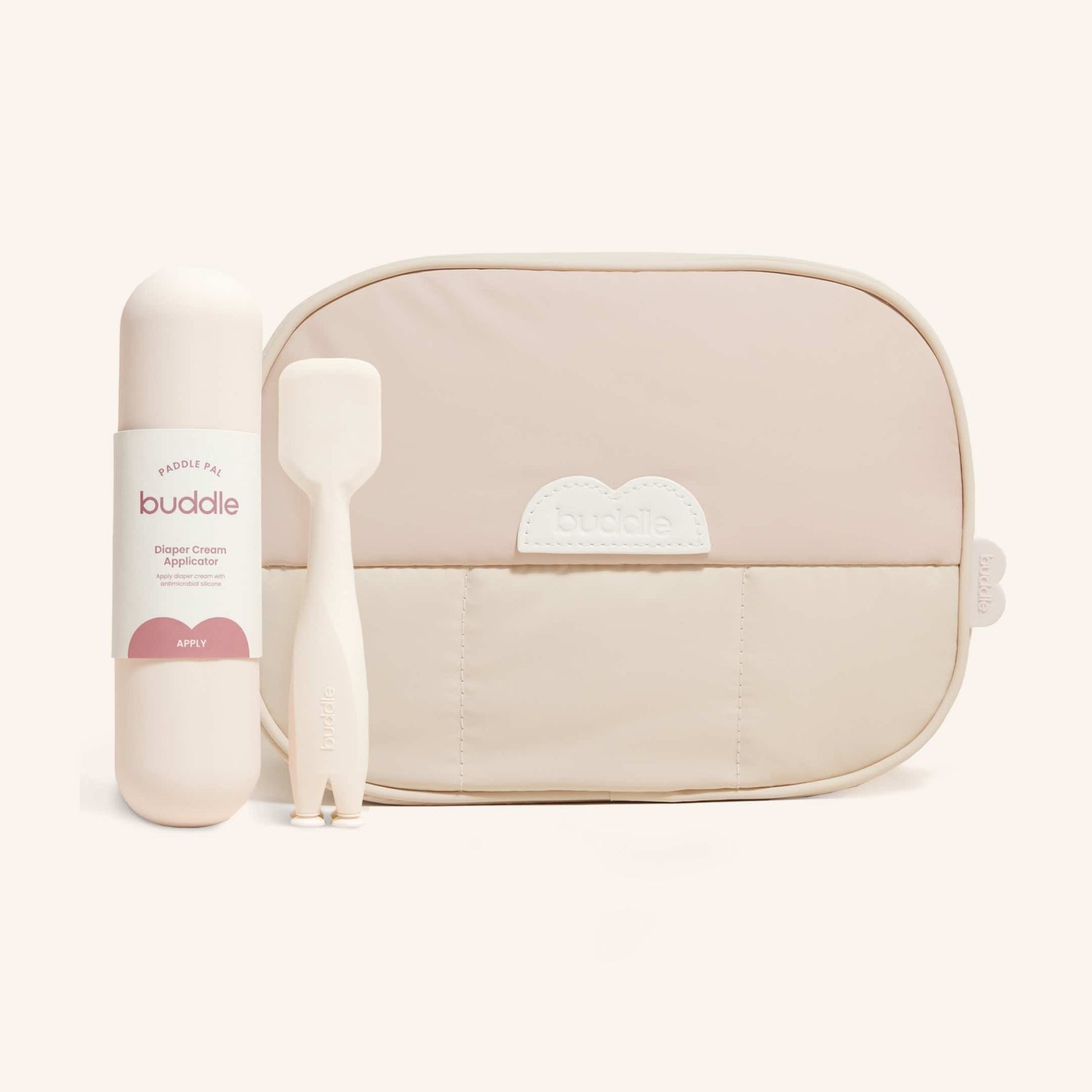 Beige quilted diaper changing bag with zip top and embossed buddle logo