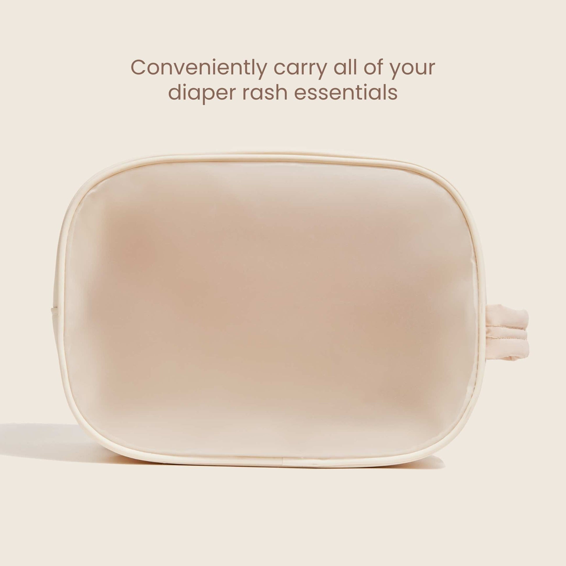 Light beige oval bum bag with zip-top opening and side pull