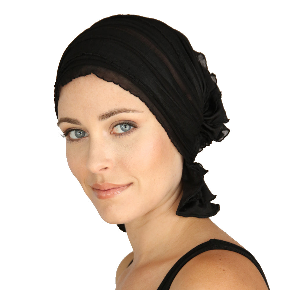Black ruffled chemo beanie with side knot and scalloped edge