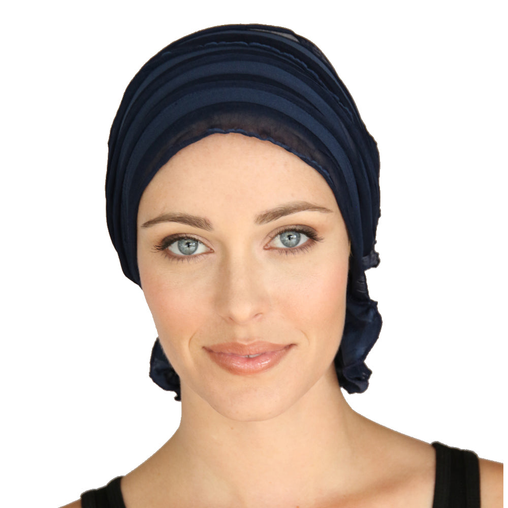 Navy chemo beanie with pleated top and ruffled side knot