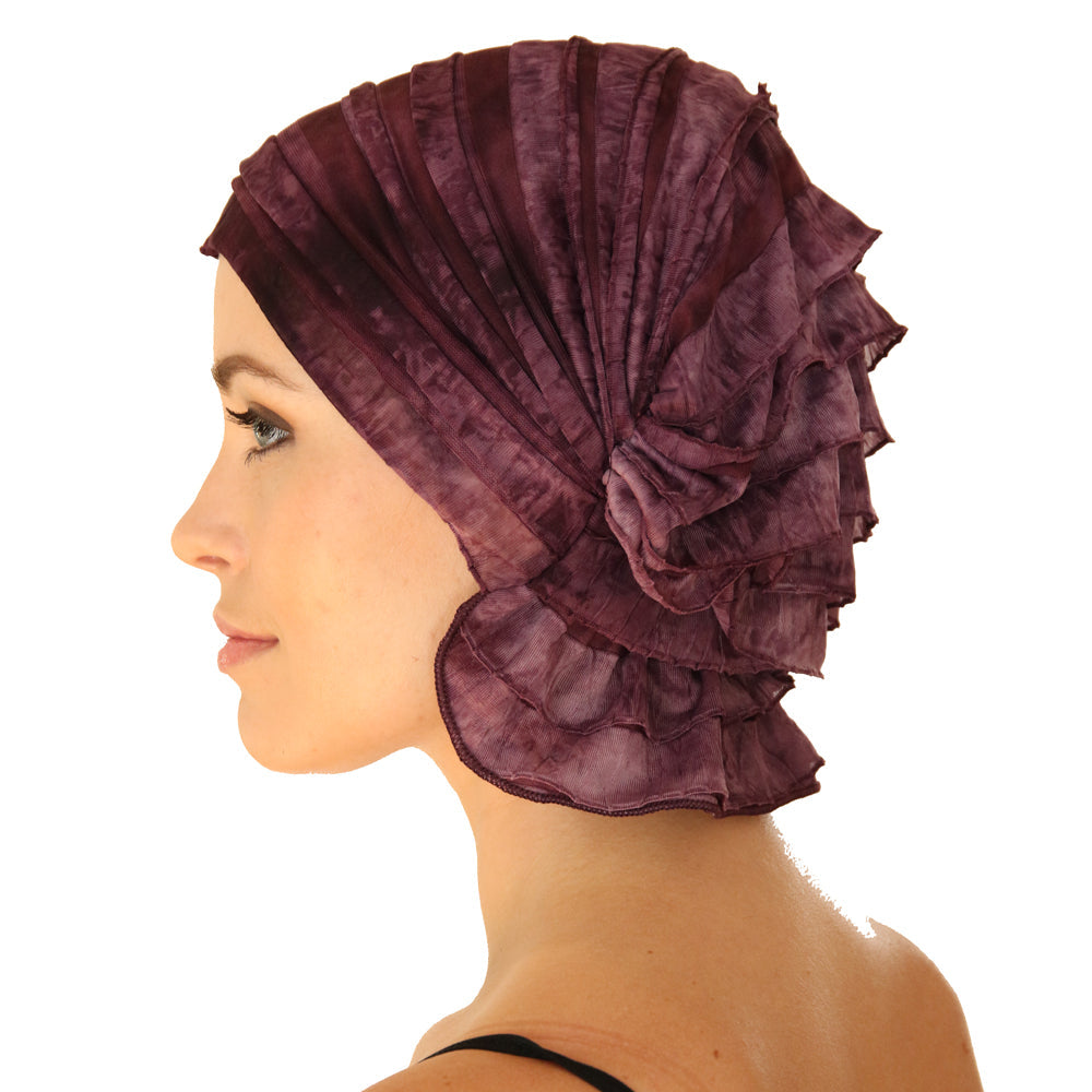 Burgundy chemo beanie cap, side view with layered ruffles and bow