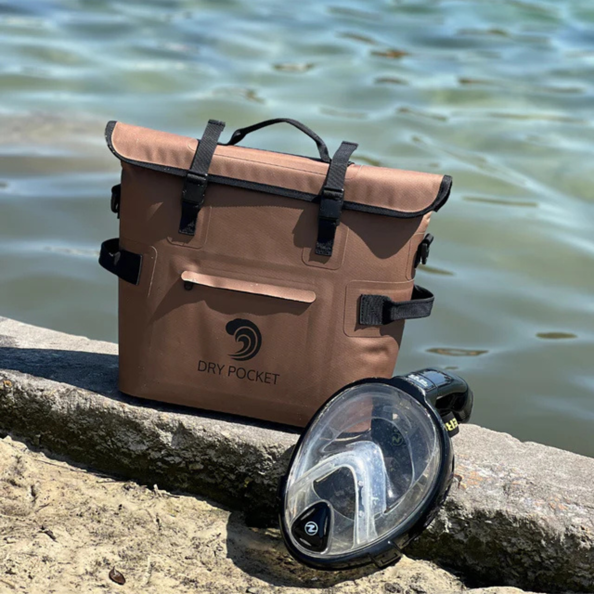 Coyote brown waterproof floating cooler bag with black straps and top handle