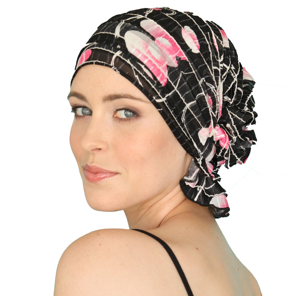 Black chemo beanie with pink and white floral grid pattern, ruched ruffle edge