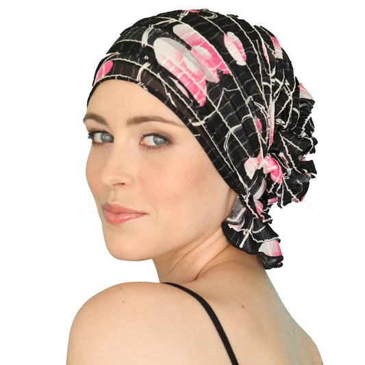 Black chemo beanie with pink and white floral grid pattern, ruched ruffle edge
