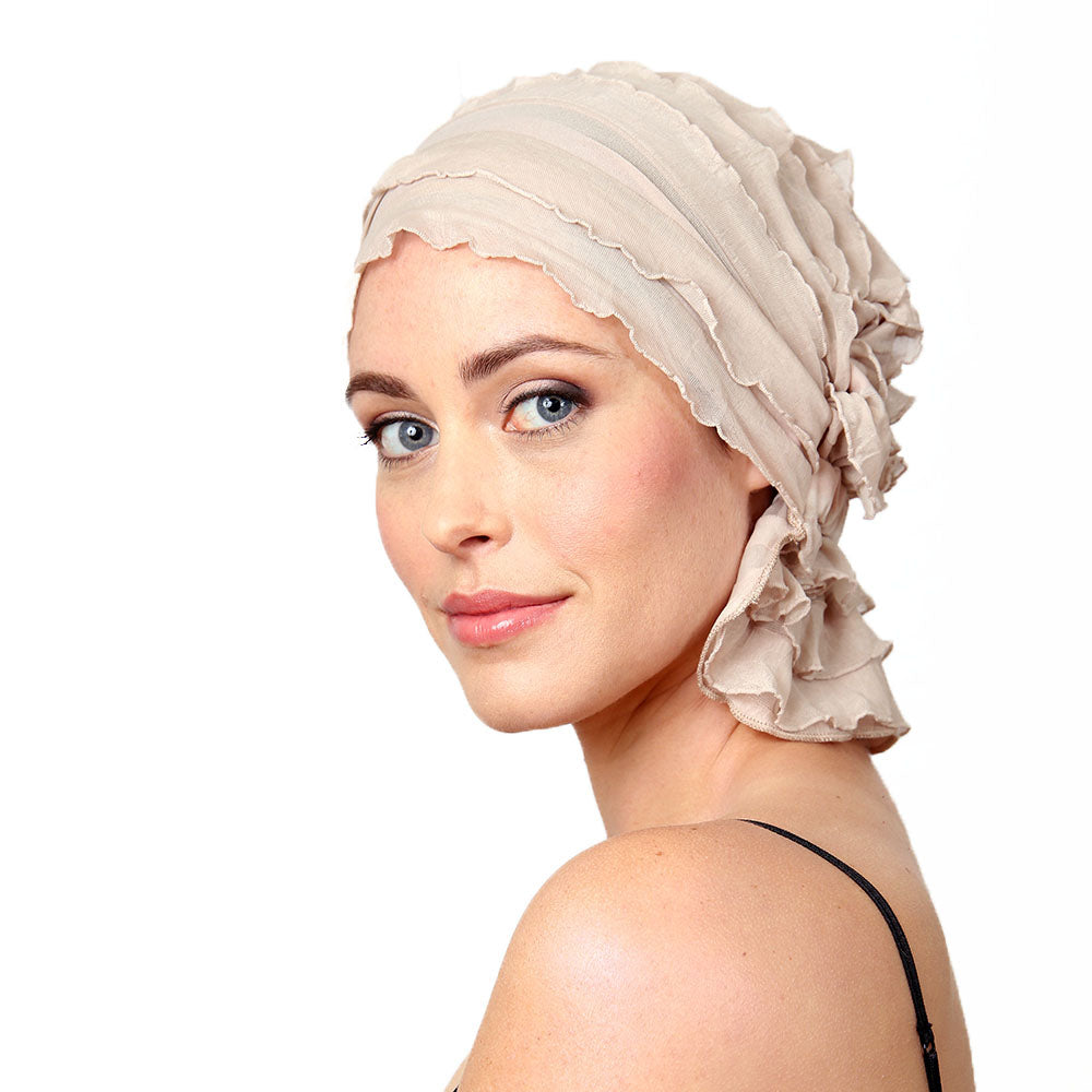Ruffled beige headscarf with layered fabric and elastic edge