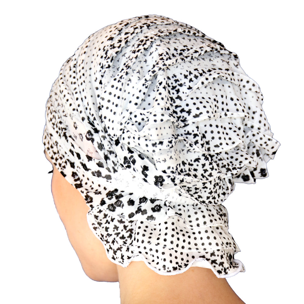 Speckled chemo beanie with draped back ruffle and side tie, white and dark dots