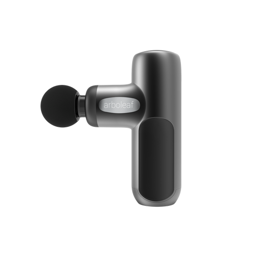 Handheld percussion massager with round black massage head and arbol eaf logo