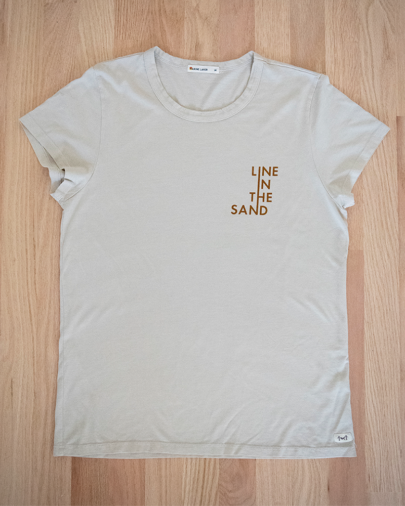Sand crewneck T-shirt flat lay front with Line in the Sand whale graphic
