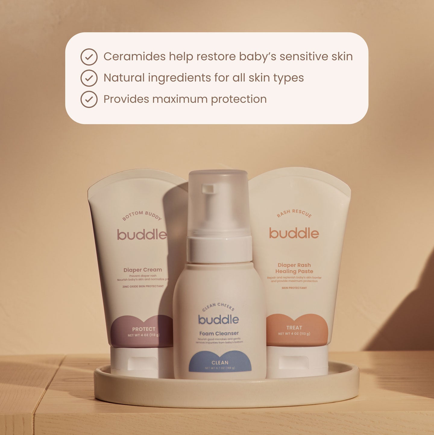 Diaper skincare system three-product set on round tray