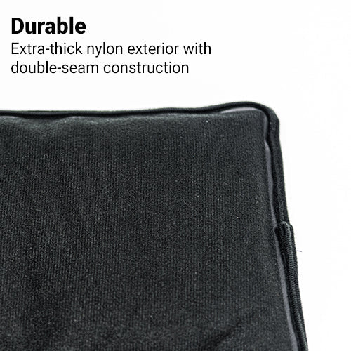 Close-up of black therapy gel pack corner with double-seam style edging.