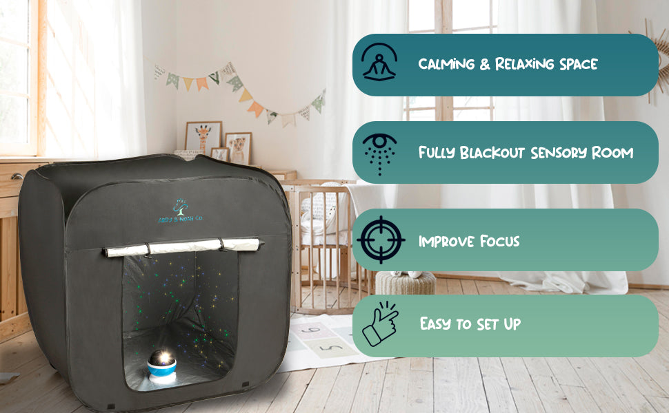 Black kids blackout tent with front window and star projector light on floor