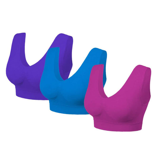 Lightweight seamless bras in purple, blue, and magenta, shown front view