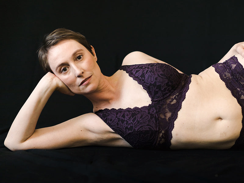 Orchid purple lace wireless bra with scalloped edges and thin adjustable straps