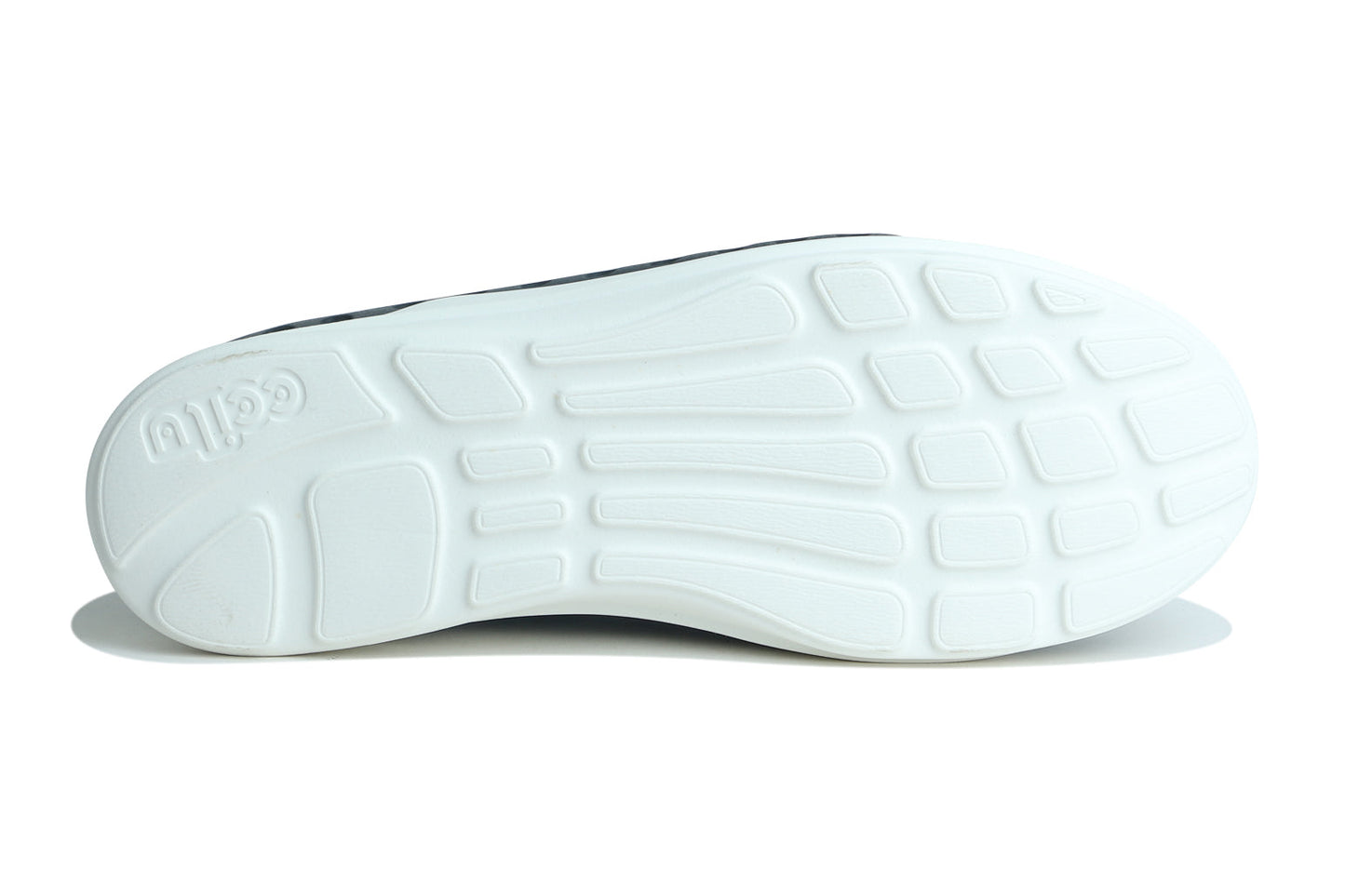 White outsole with raised traction pattern for slip-on water shoes