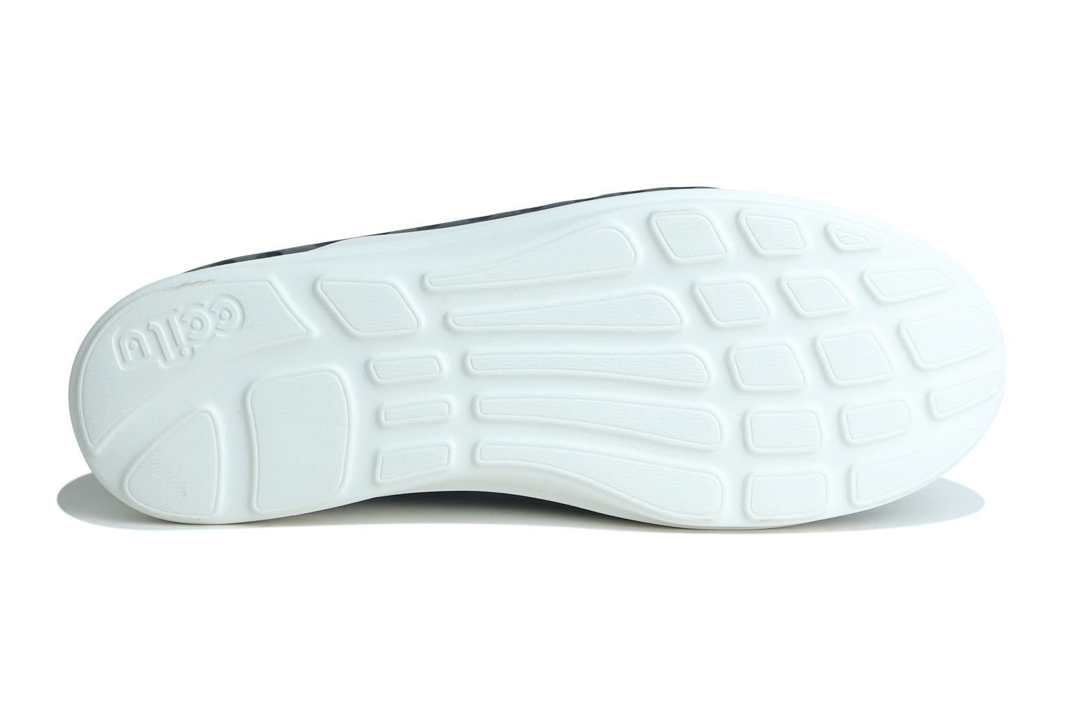 White outsole with raised traction pattern for slip-on water shoes