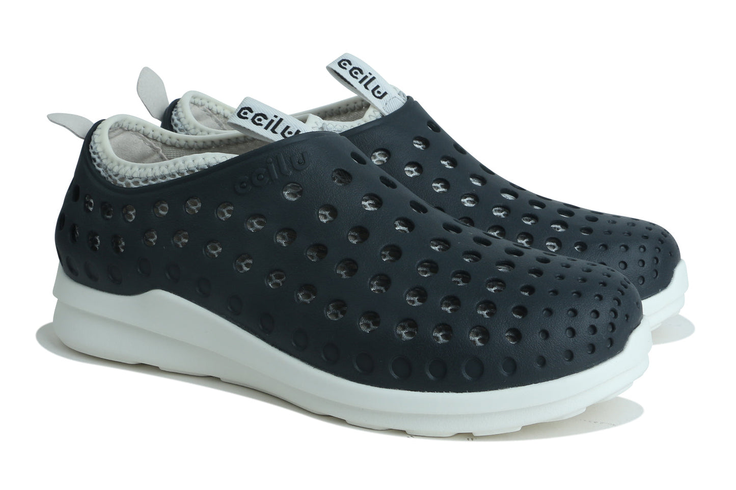 Black slip-on men’s water shoes with perforated upper, white sole, and gray collar