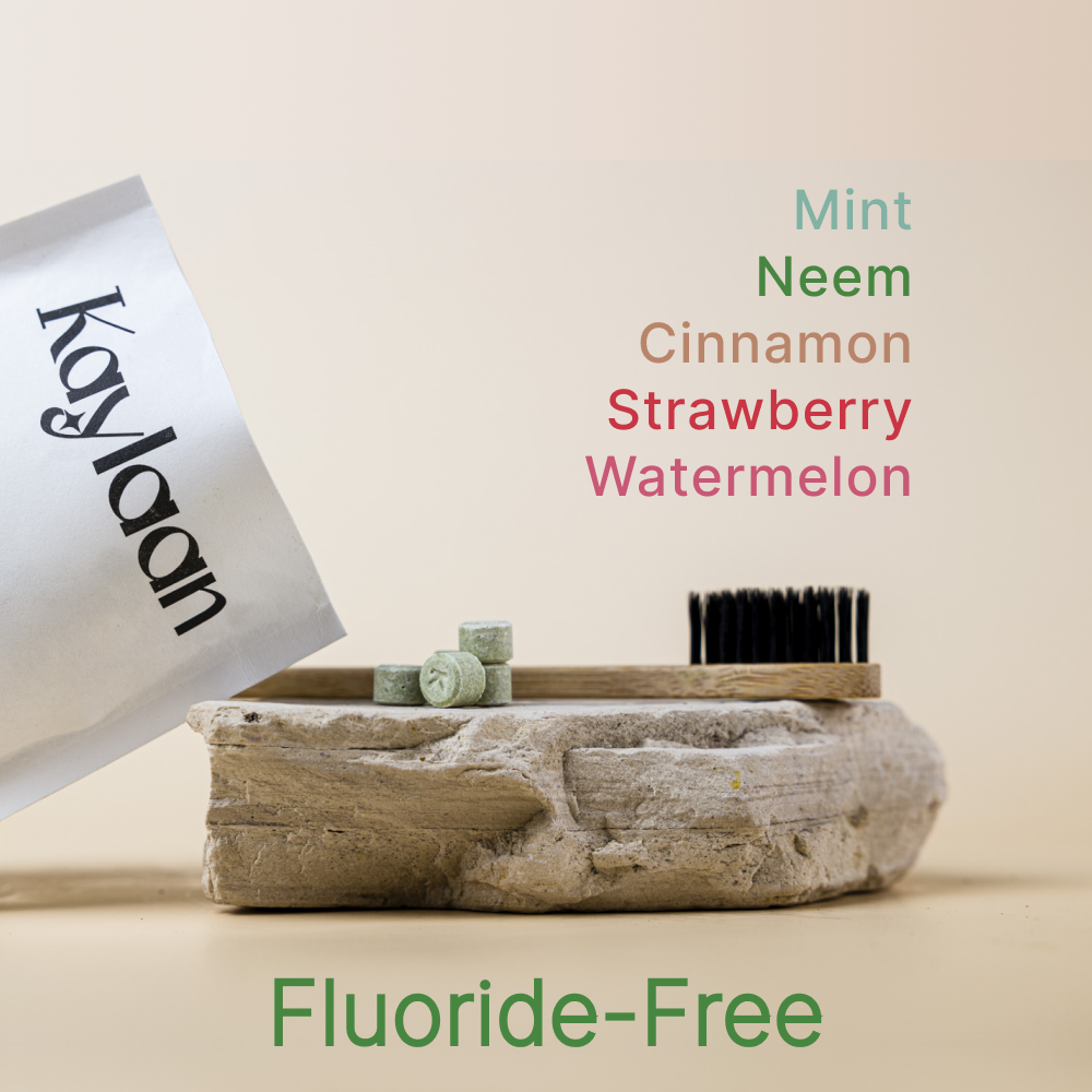 Fluoride-free toothpaste tablet trial pack with stacked flavor tablets