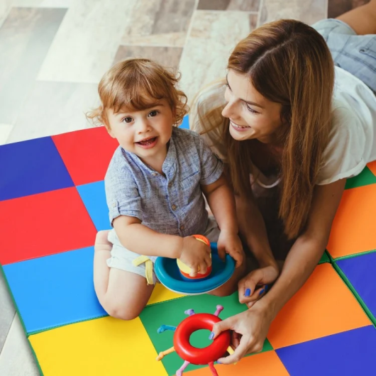 Baby activity floor mat with multicolor checkerboard foam squares