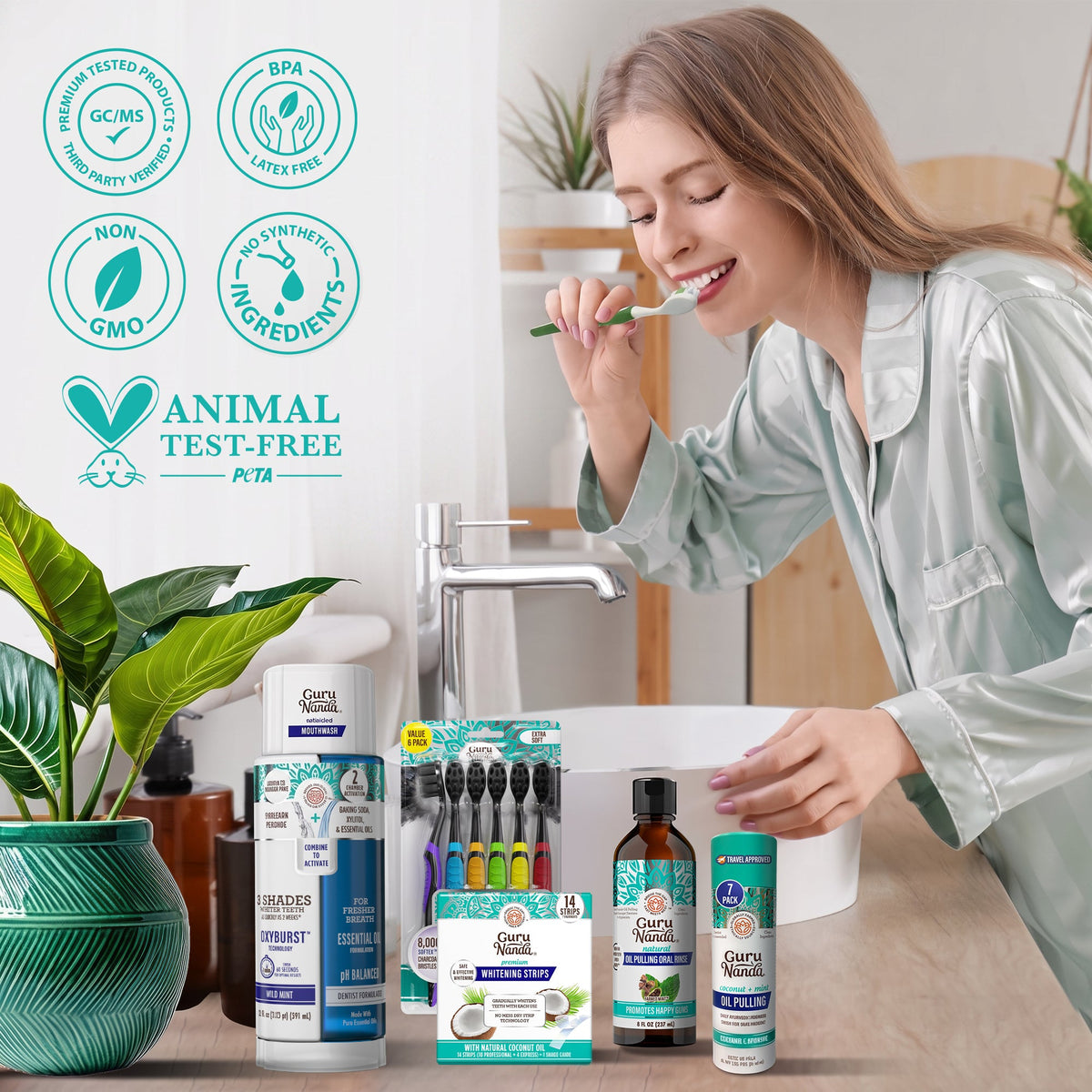 Charcoal oral care kit with mouthwash, oil rinse, and whitening strips on countertop