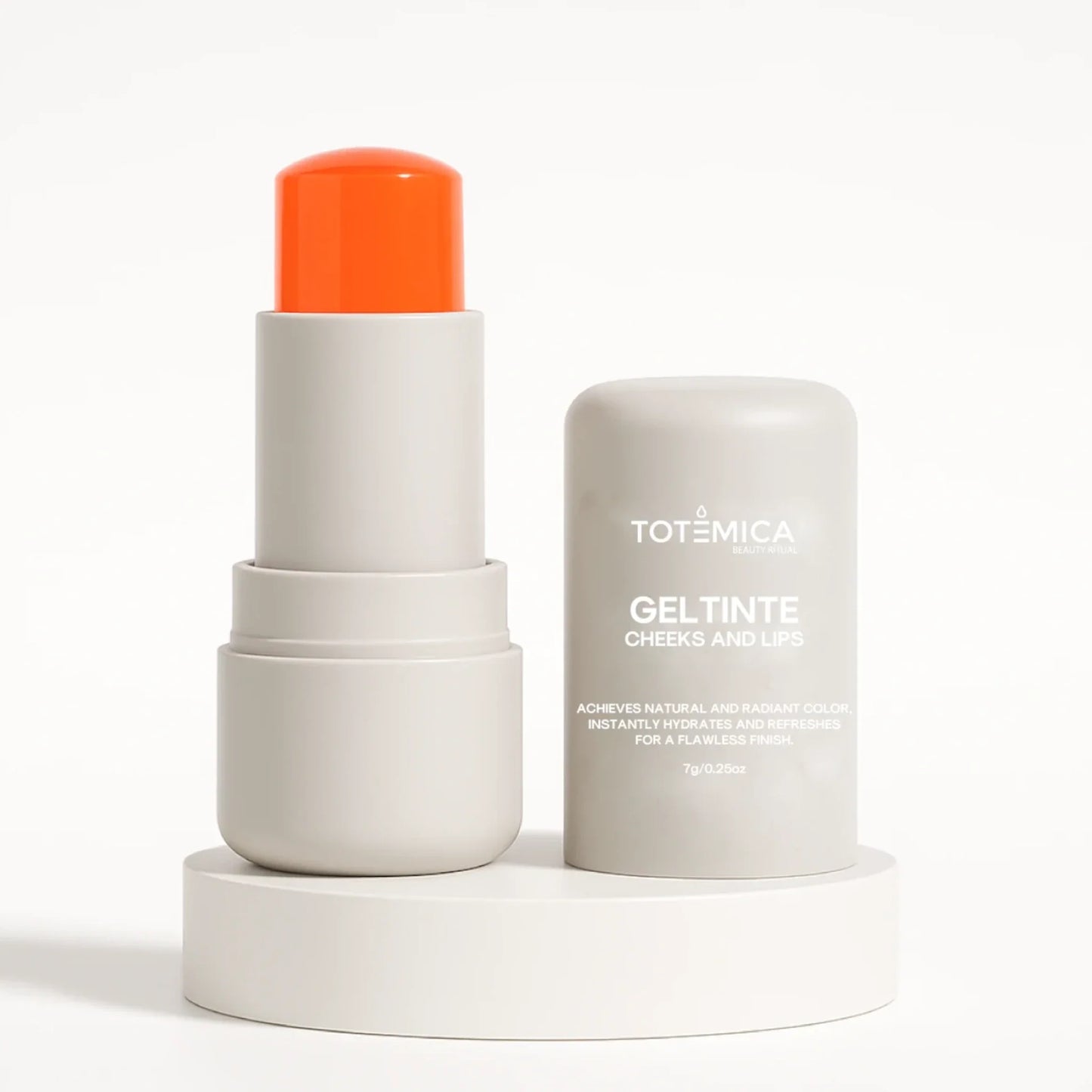 Gel tint for cheeks and lips with bright orange cap, white tube and cylindrical container