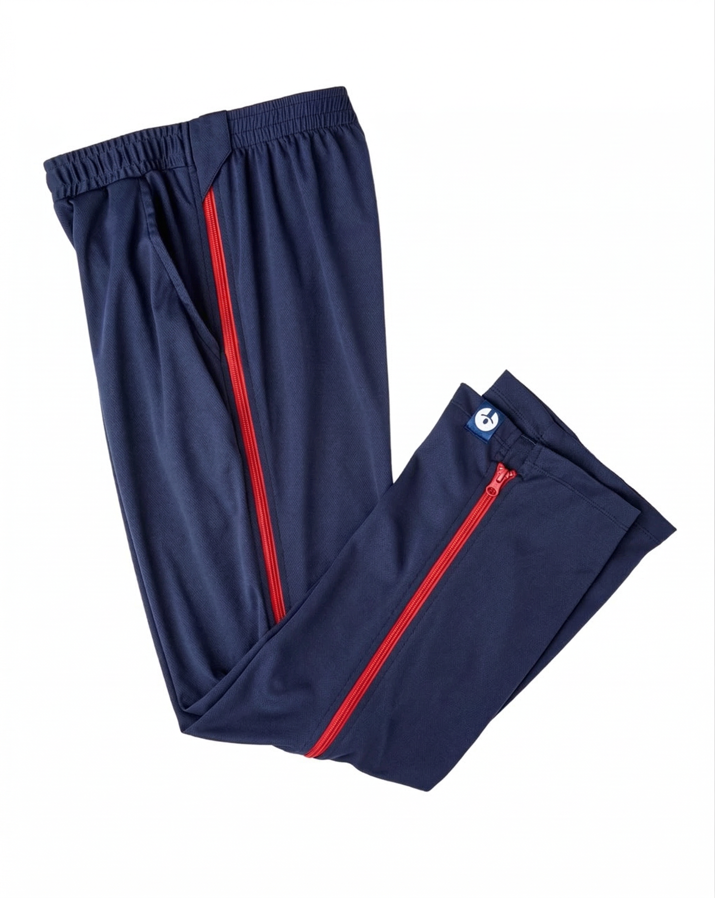 Navy blue pants with red zippers on a white background