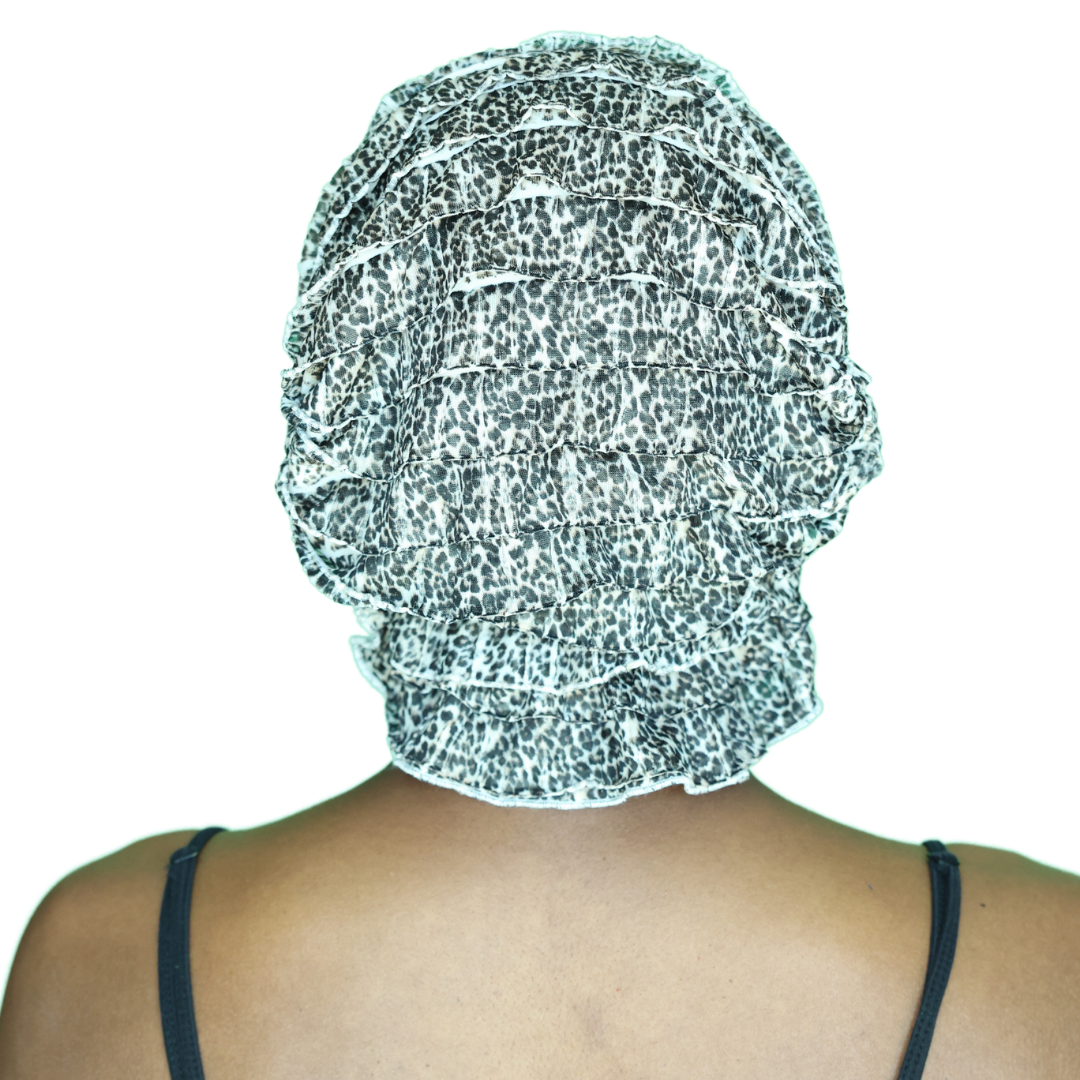 Leopard-print head wrap, full back view with gathered ruffle and speckled pattern