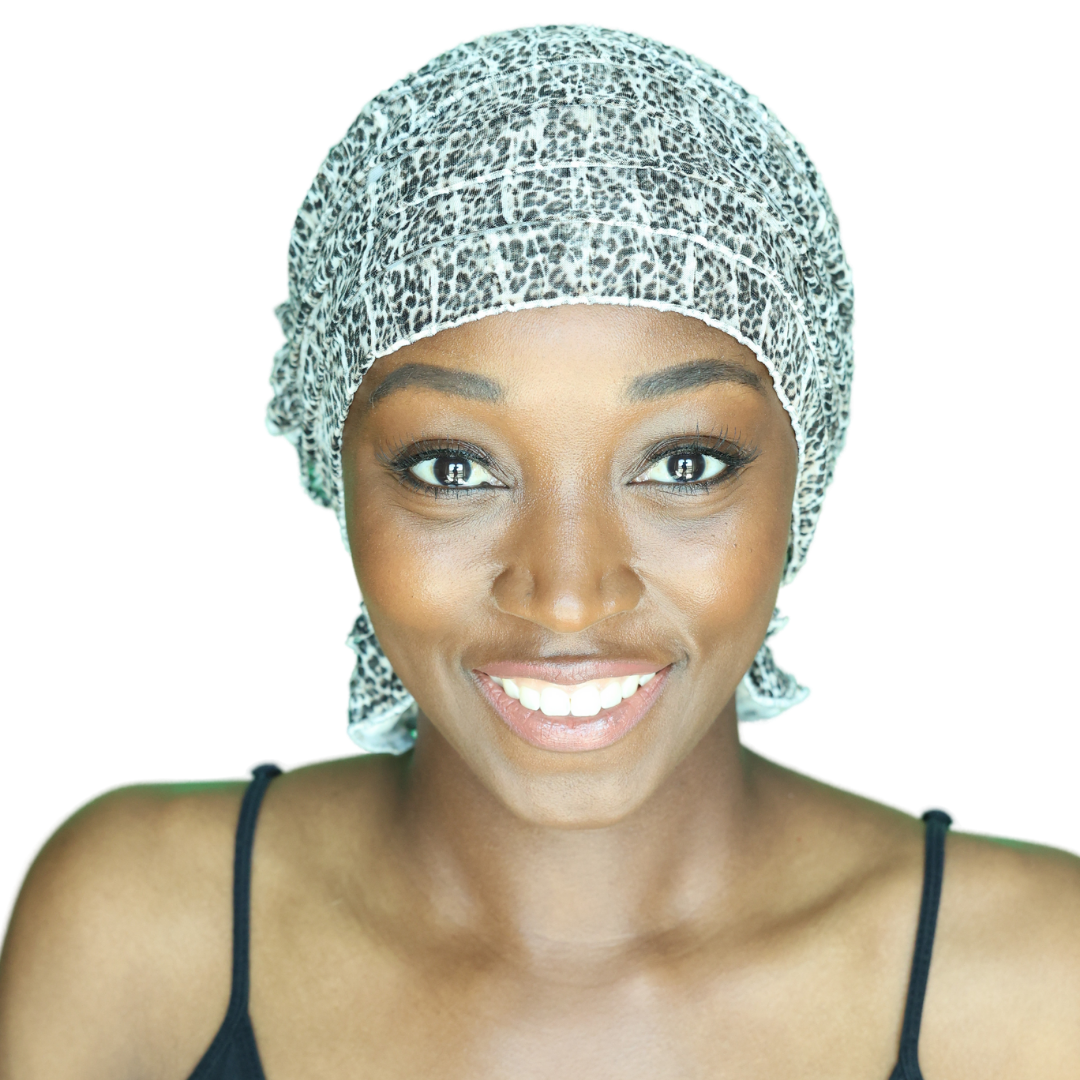 Leopard-print head wrap with ruffled edge, speckled black and white pattern
