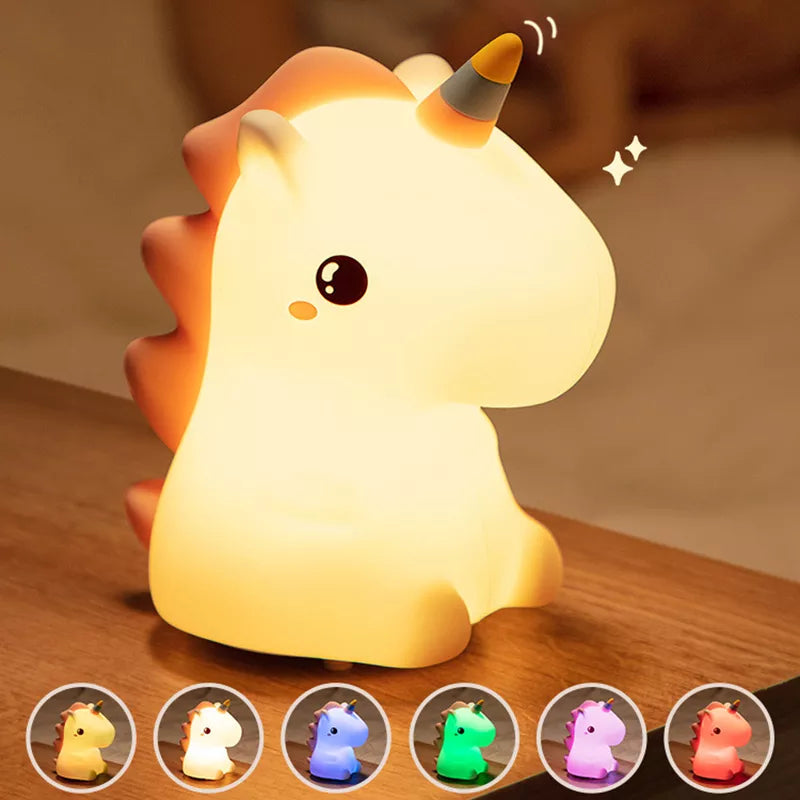 Glowing unicorn LED night light, seated white unicorn with orange mane and yellow horn