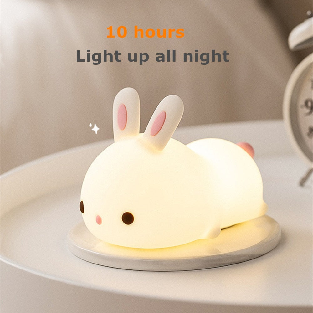 White bunny night light with warm glow, soft silicone ears and cute face