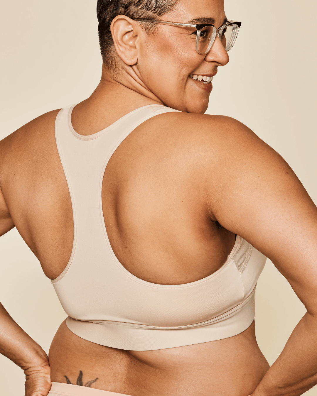 Buff racerback sports bra back view with smooth coverage and seam details