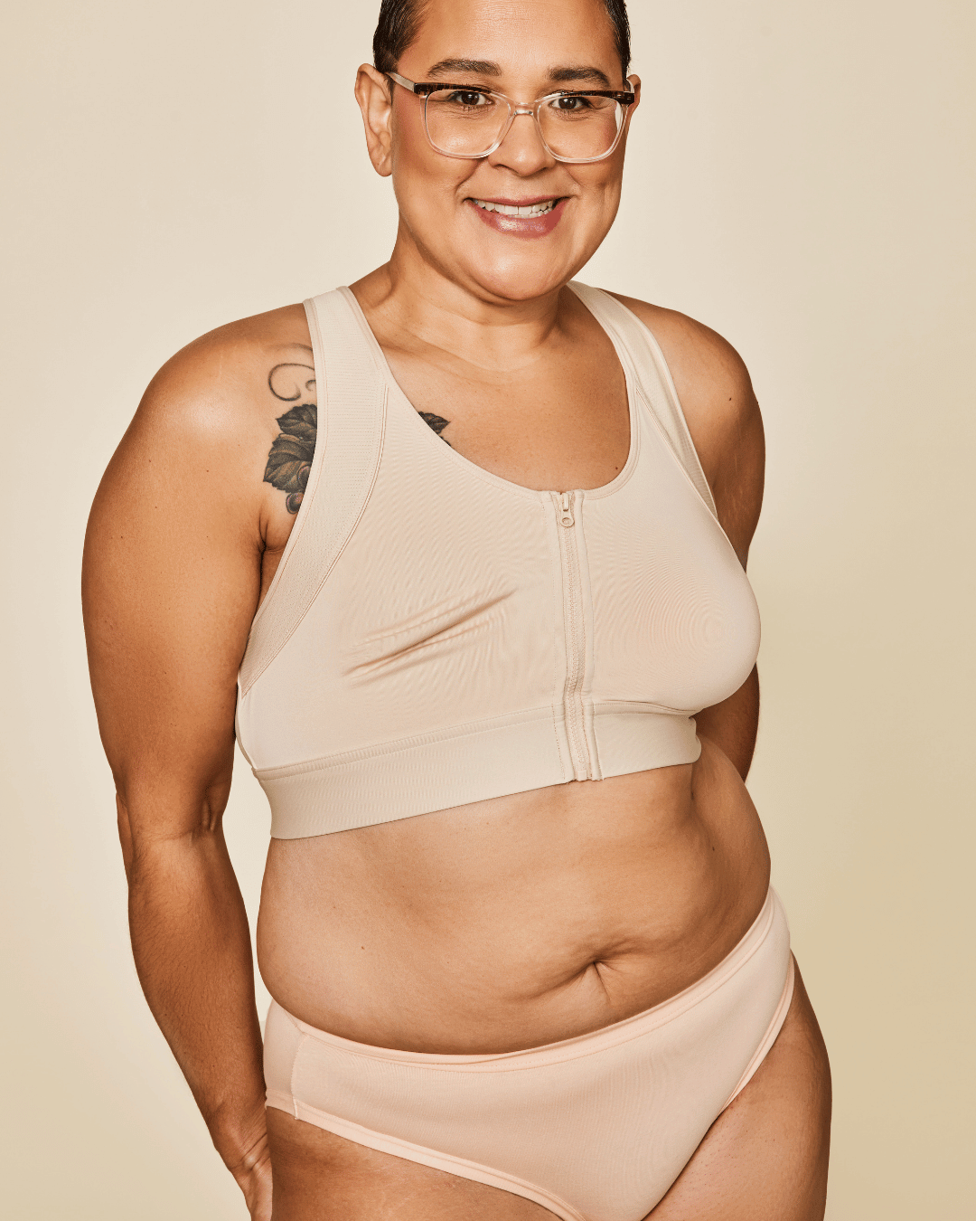 Buff sports bra with front zipper placket and scoop neckline