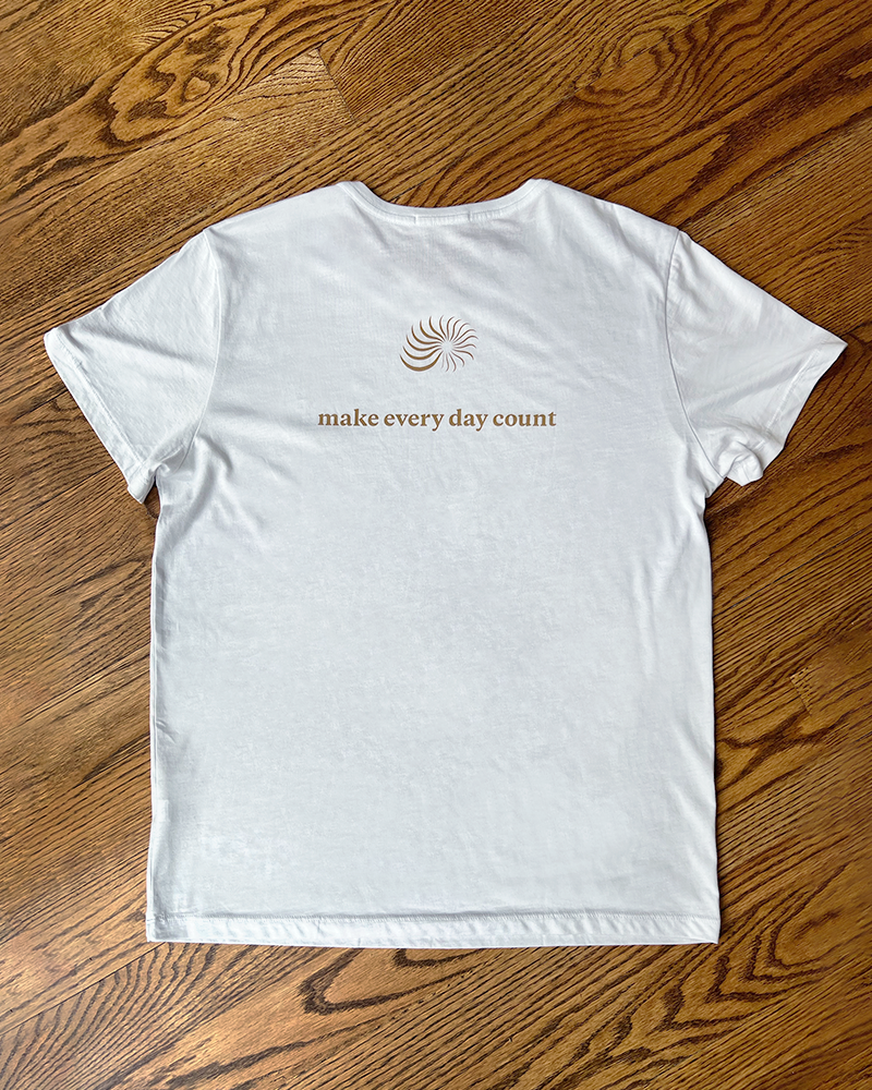 White unisex T-shirt with swirl logo and make every day count text