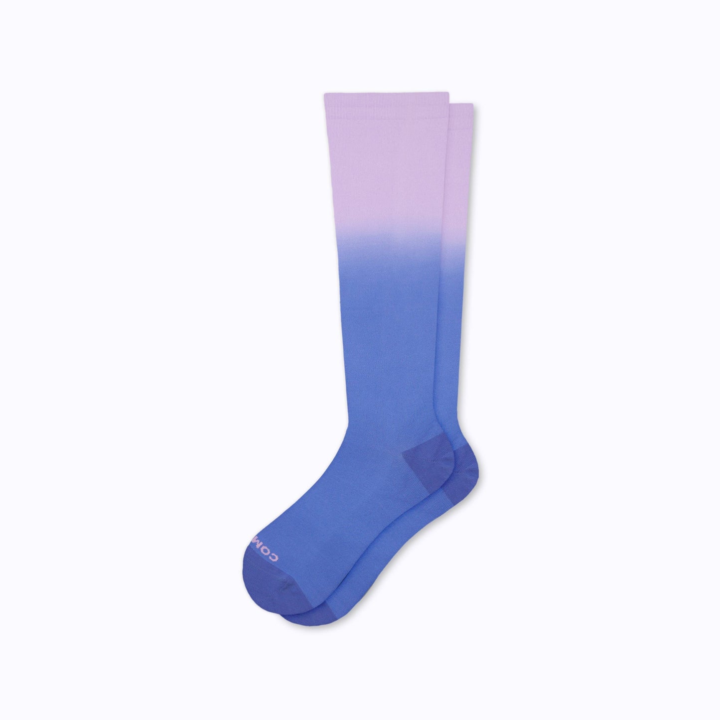 Knee-high ombre compression socks in lavender to blue gradient, ribbed knit cuff