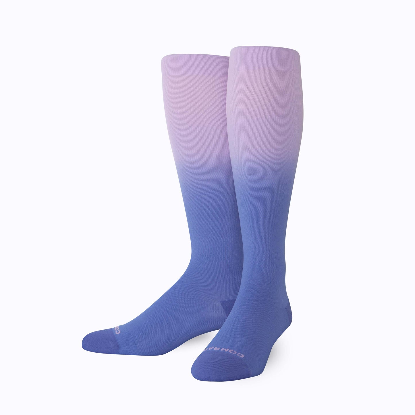 Knee-high ombre compression socks, two socks laid flat with lavender-to-blue gradient