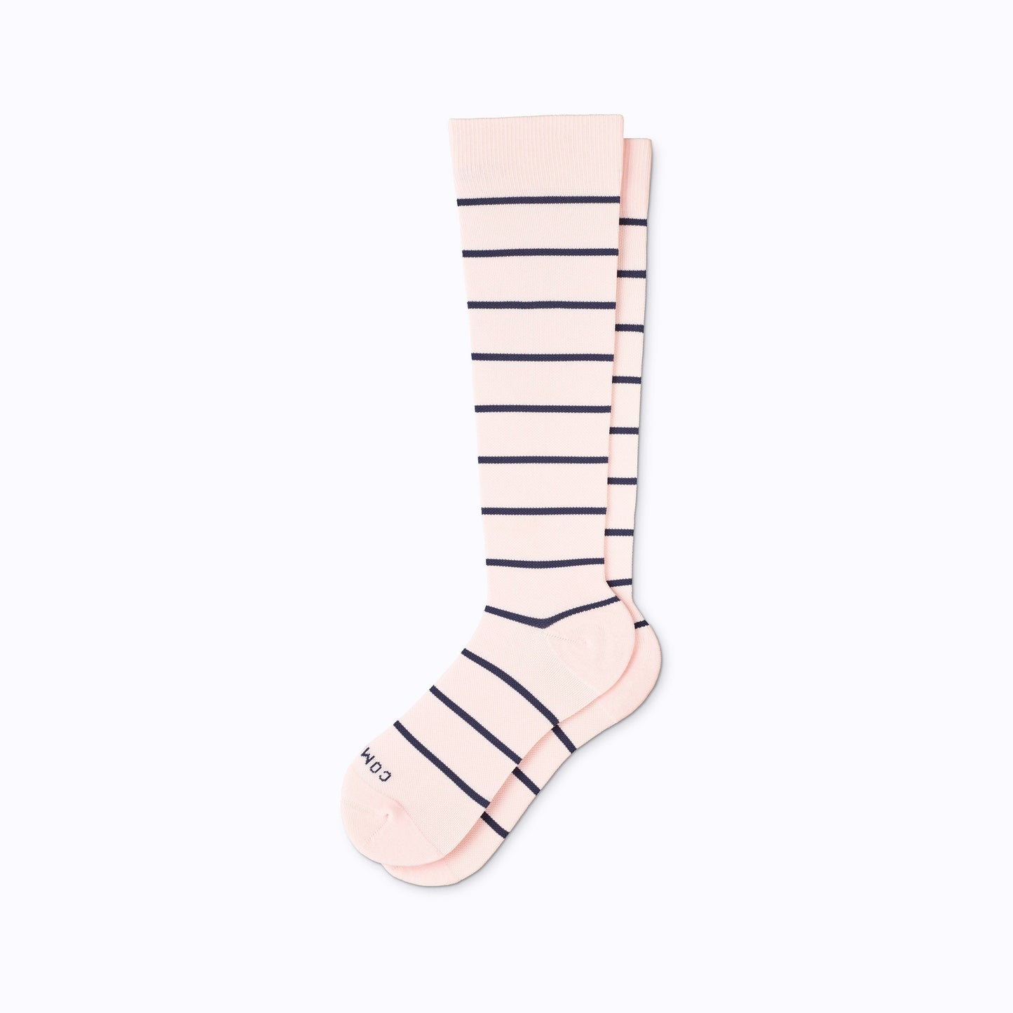 Knee-high compression socks in pale rose with navy horizontal stripes and cushioned toe