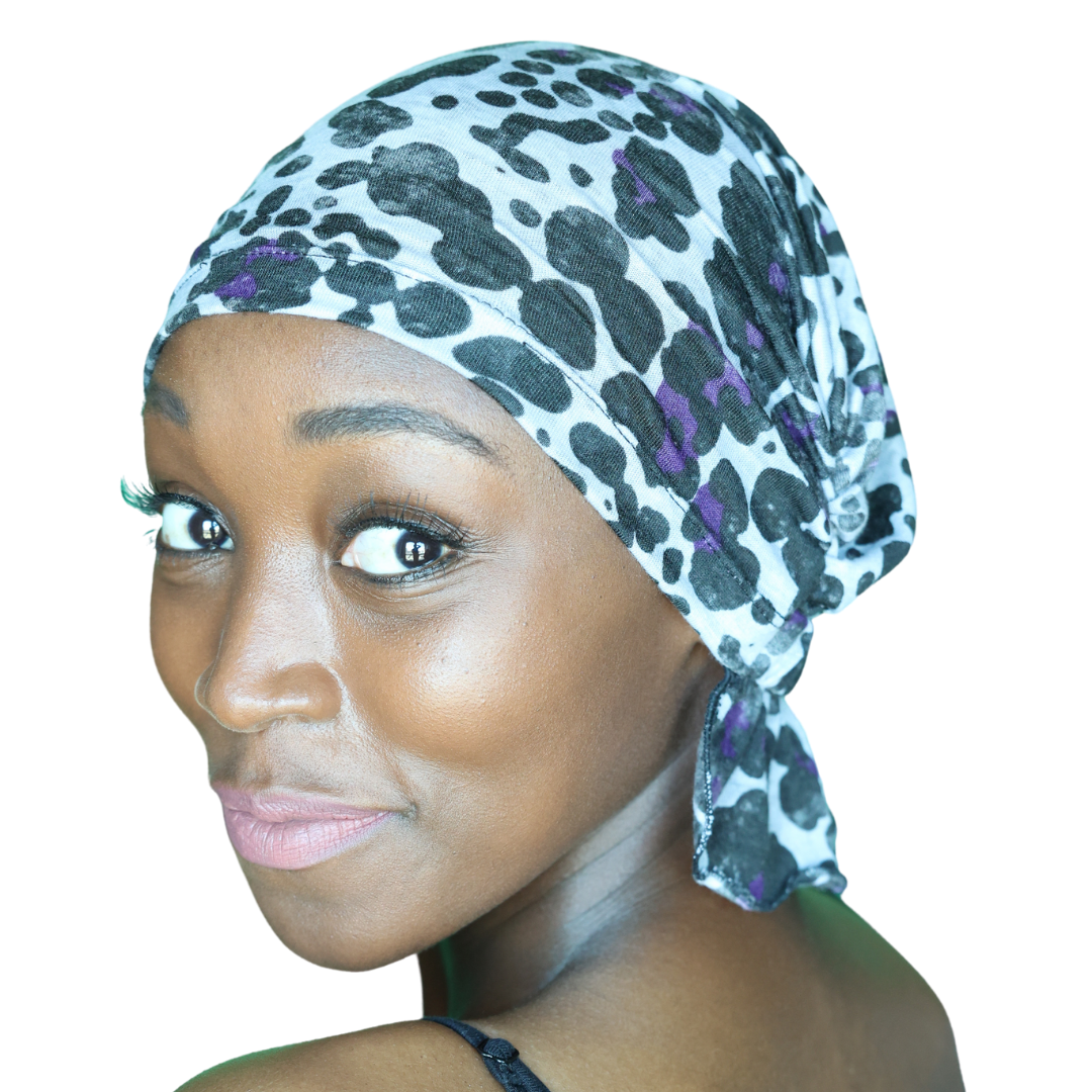 KATY CHEMOBEANIES® chemo beanie with leopard print in dark teal and purple, side tie