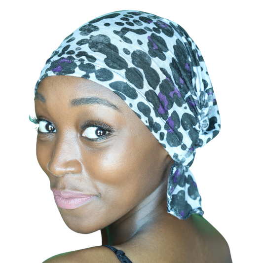 KATY CHEMOBEANIES® chemo beanie with leopard print in dark teal and purple, side tie