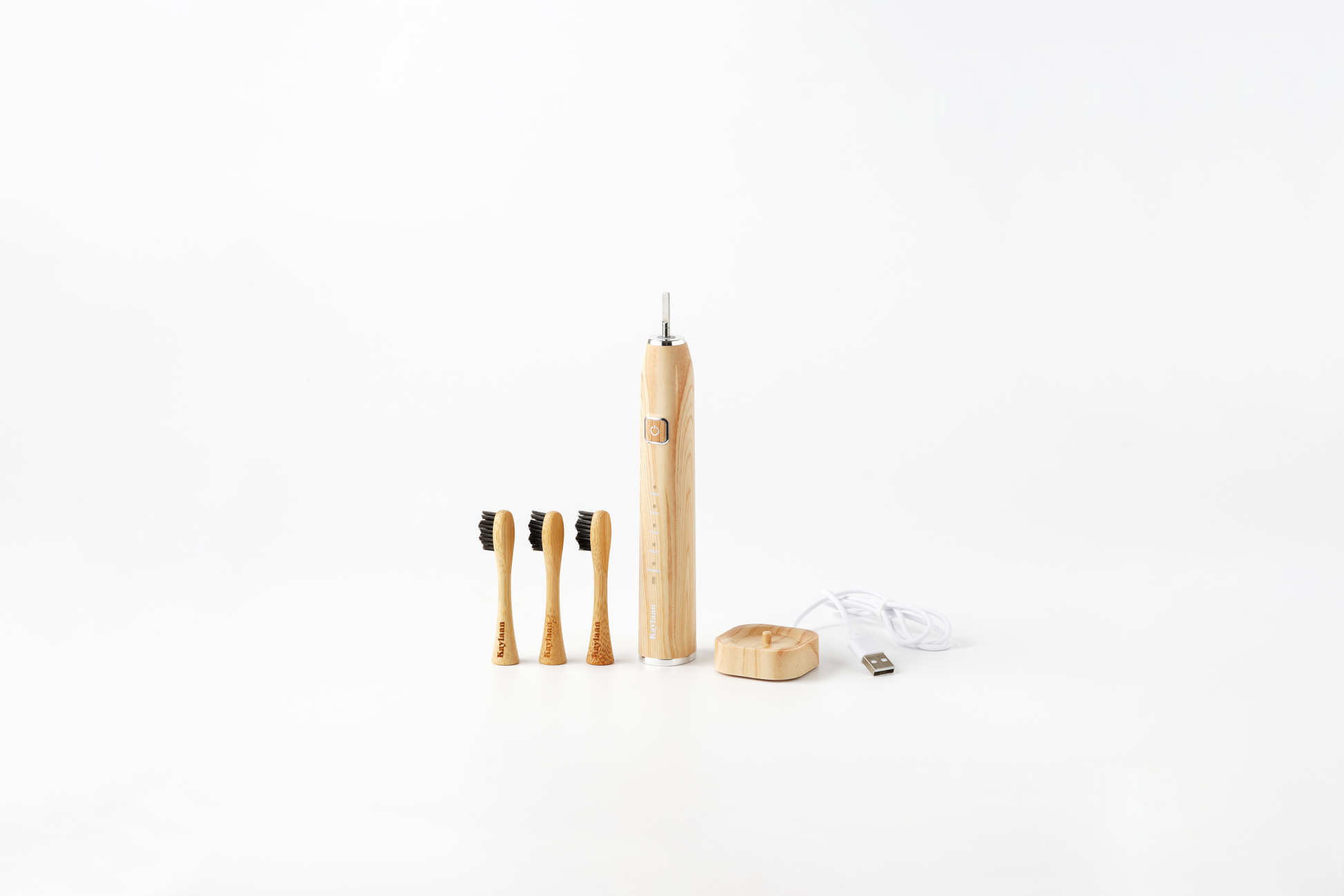 Bamboo electric toothbrush set with wooden handles, black bristle heads, and base
