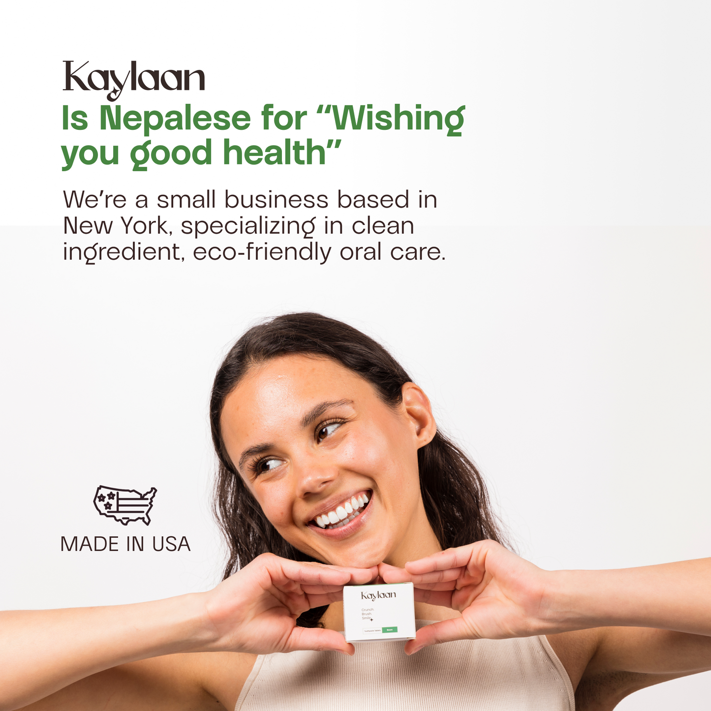 Kaylaan neem toothpaste box held by smiling woman, Made in USA icon
