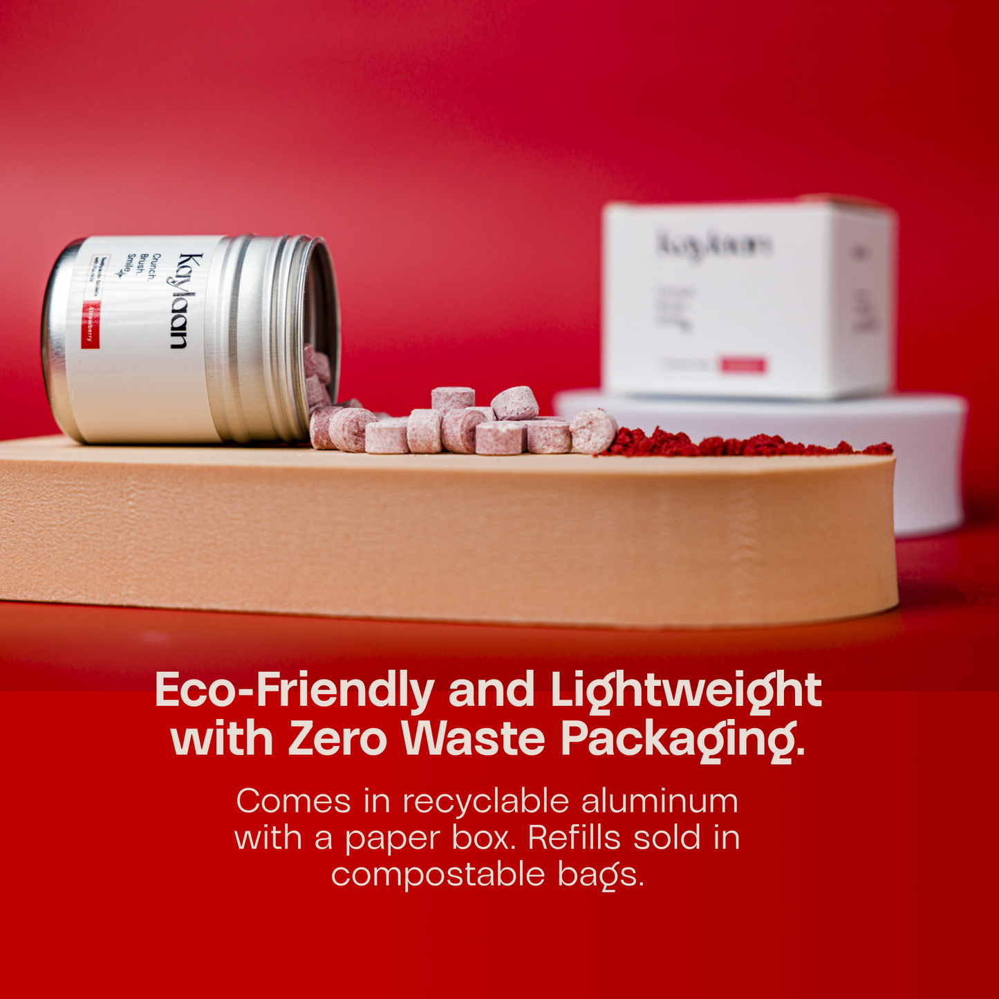 Non-fluoride strawberry toothpaste tablets jar with scattered tablets and paper box