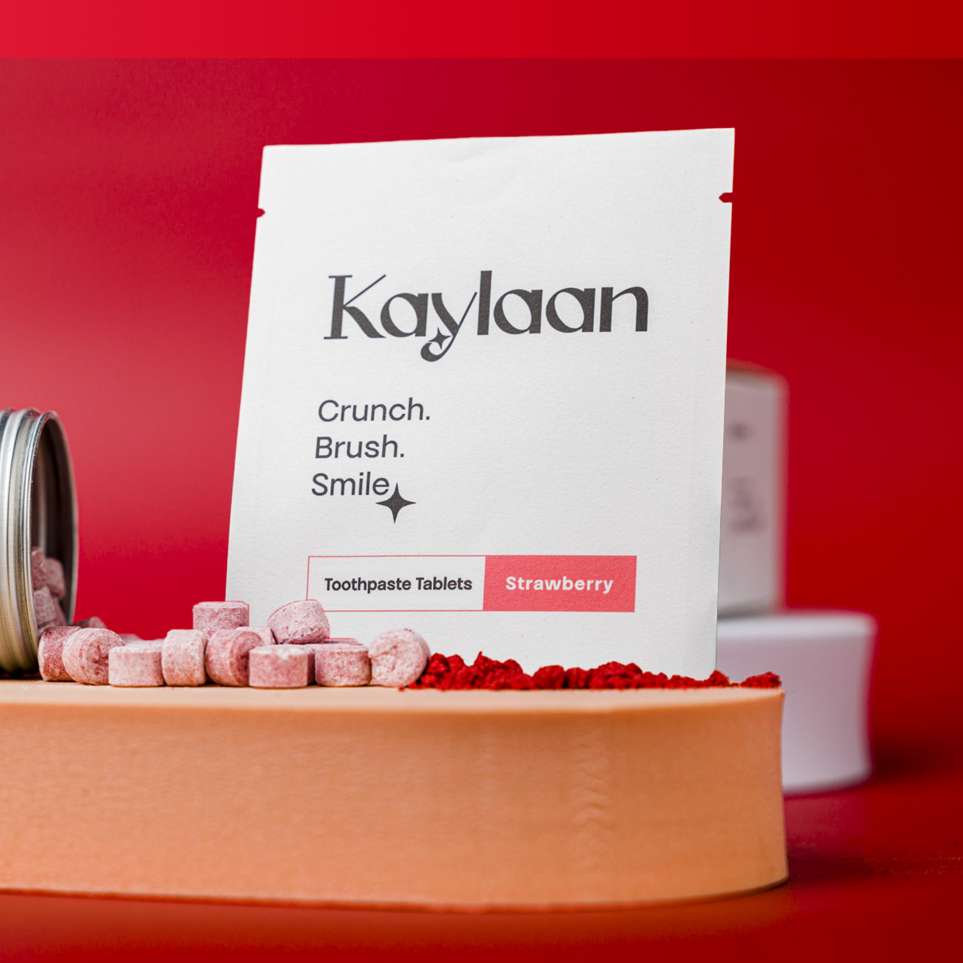 Strawberry toothpaste tablet refill pouch with crushed tablet pieces